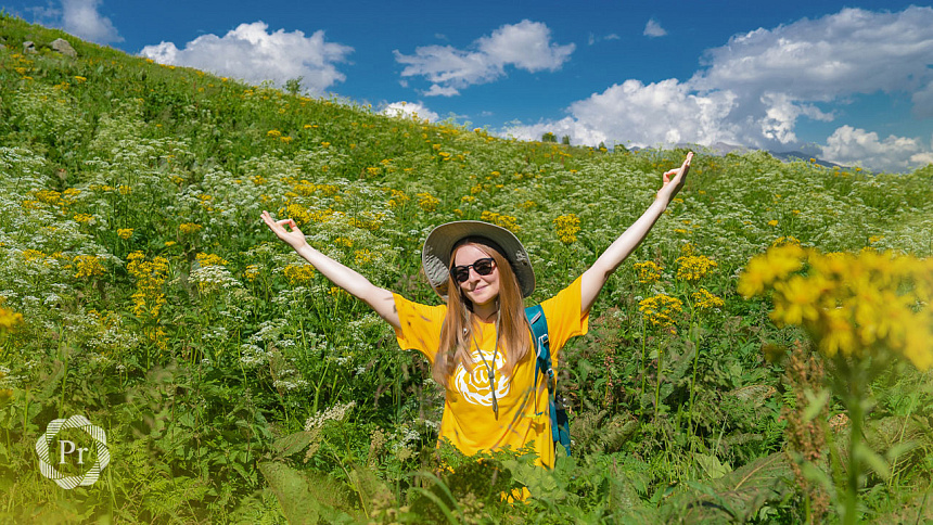 girl in a field with yellow flowers