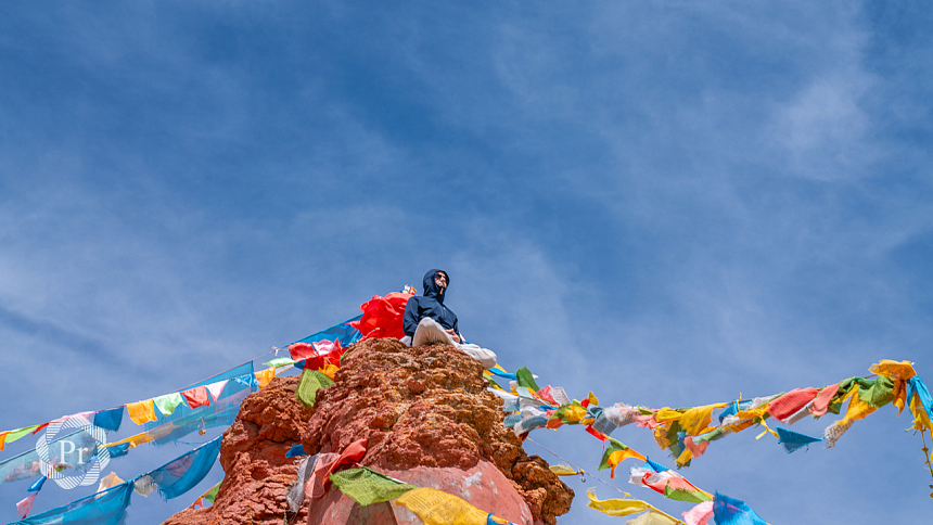 person meditating against the sky background