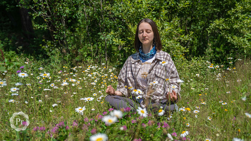 girl practicing pranayama in nature
